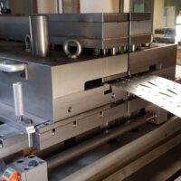 Press tool maker
