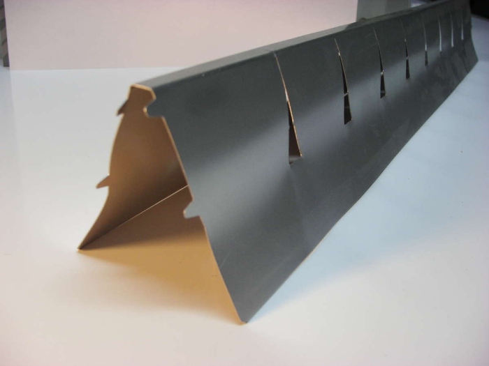 Profiling line for central lighting optics