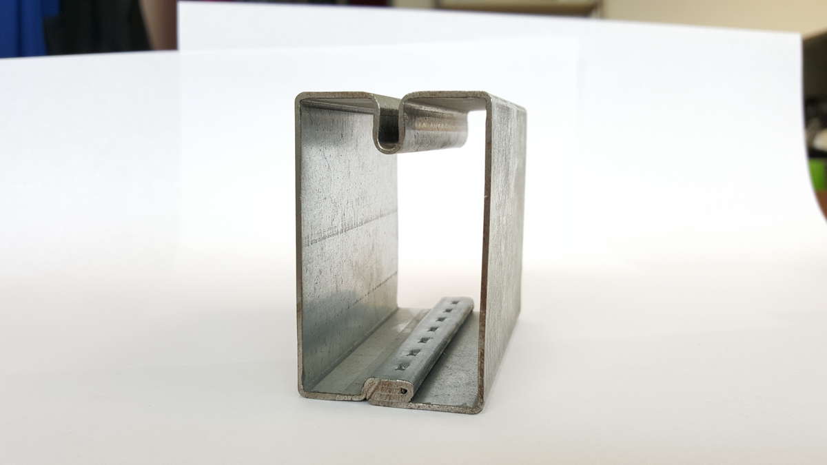 Profiling line for garage door frames